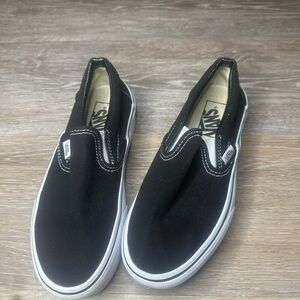 Vans womens Black and White Slip-On platform Sneakers